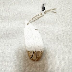 Free People clay feather ornament